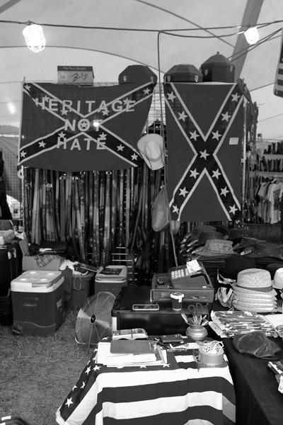 Photo by Clifford Oliver, confederate flags displayed in a Washington County fair booth