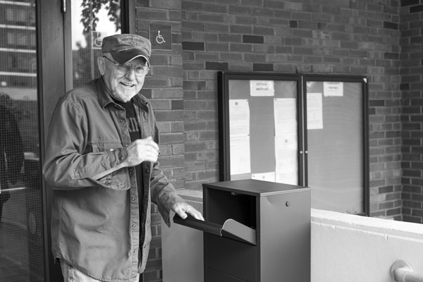 Bob Waltermeir of North Adams smiles after depositing his ballot for the Massachusetts state primary election in a drop box at North Adams City Hall in late August. Waltermeir was one of nearly 1 million voters statewide who cast ballots in advance of the Sept. 1 election.  