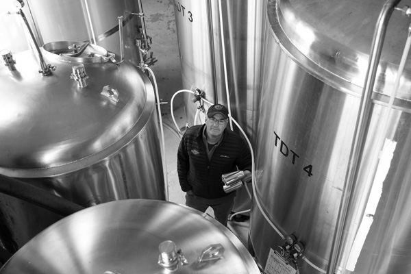 John Carr, owner of Adirondack Pub & Brewery in Lake George, is closely watching the effects of new U.S. tariffs, as he relies on imported malt and barley to produce his lagers and ales. Joan K. Lentini photo
