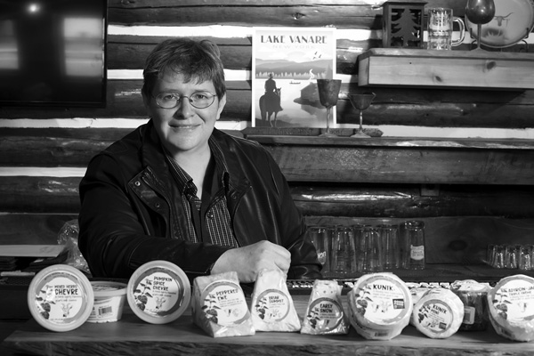Co-owner Sheila Flanagan displays some of the varieties of Nettle Meadow cheeses at the artisan producer’s new facility in Lake Luzerne, N,Y. Joan K. Lentini  photo