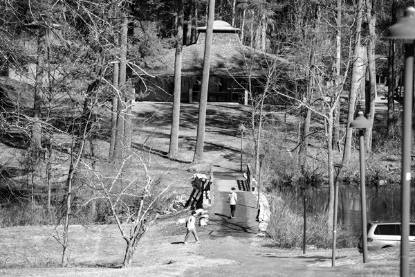 Students cross a bridge as they head toward the library and classroom buildings on the wooded campus of Bard College at Simon’s Rock in Great Barrington, Mass. Scott Langley photo